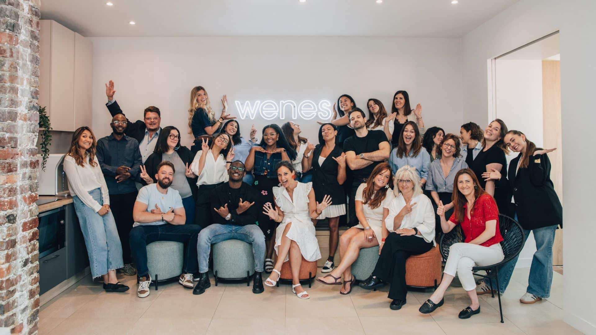 WENES Group employees in fun poses